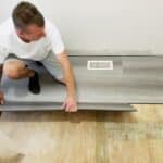 flooring-installation-updating-floor-to-new-laminate-clipboard-that-looks-like-ceramic-tiles.jpg
